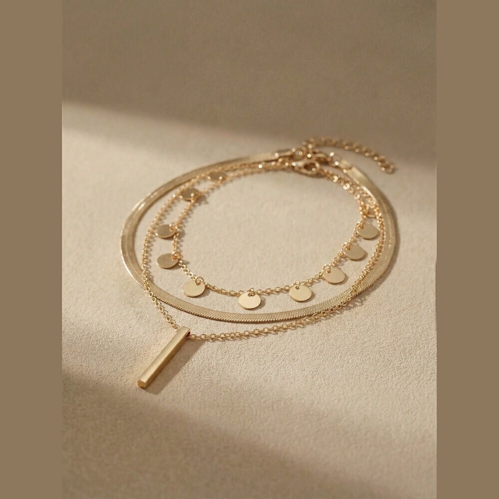 Gold 3 Piece Necklace with Bar Pendant and Disc Charms